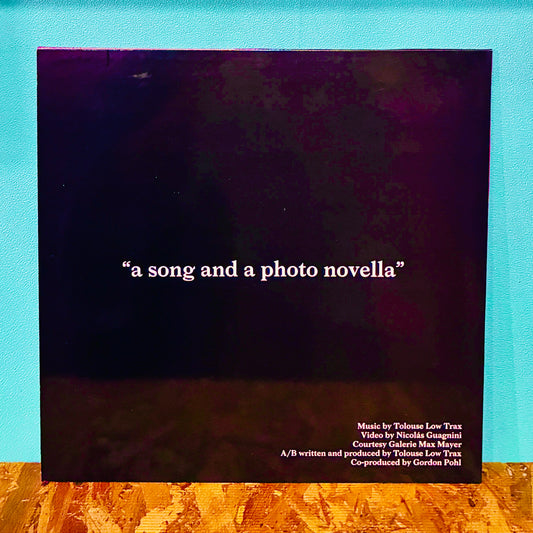 Tolouse Low Trax / Nicolàs Guagnini – A Song And A Photo Novella
